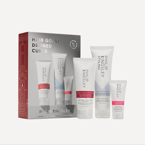 Set of Philip Kingsley hair care products with packaging on a white background