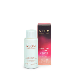 NEOM bath milk bottle and packaging on a white background