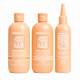 Three peach-colored Hairburst hair care bottles on a white background: Longer Stronger Hair shampoo, conditioner, and hydrating & balancing scalp tonic.