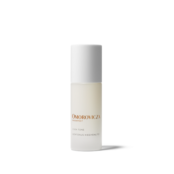Omorovicza Harper Skin Tone Retinol Kievelit eye tone serum in a frosted glass bottle with a white cap, shown on a clean white background.
