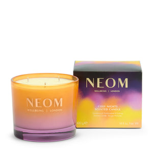 Neom scented candle with packaging on a white background