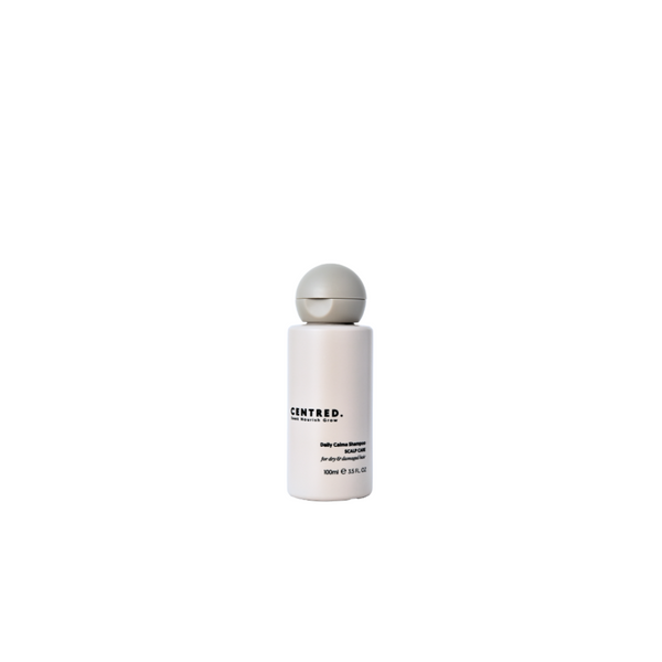 White bottle with a gray cap on a white background