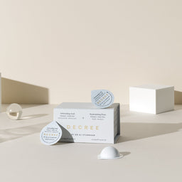 Decree Weekly Decree packaging with multiple capsules on top