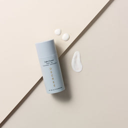 Decree Light Cleanse bottle with three drops of texture