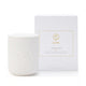 White candle with ribbed texture and matching white box featuring 'ESPA' branding on a white background.