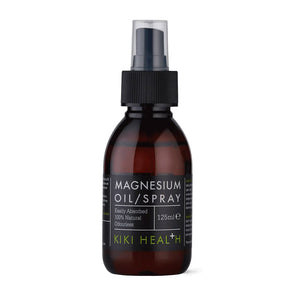 Brown spray bottle labeled 'Magnesium Oil Spray' by KIKI Health on a white background