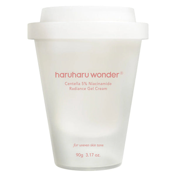 White jar of haruharu wonder cream with red text on a white background