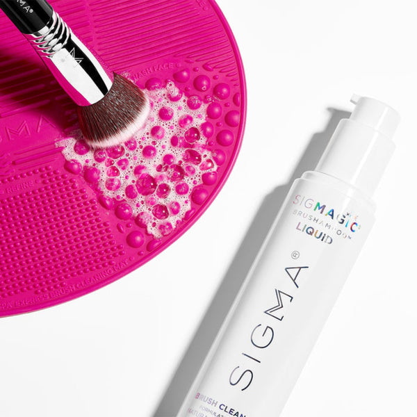 Sigma Beauty Sigmagic Brushampoo Liquid applied to a brush