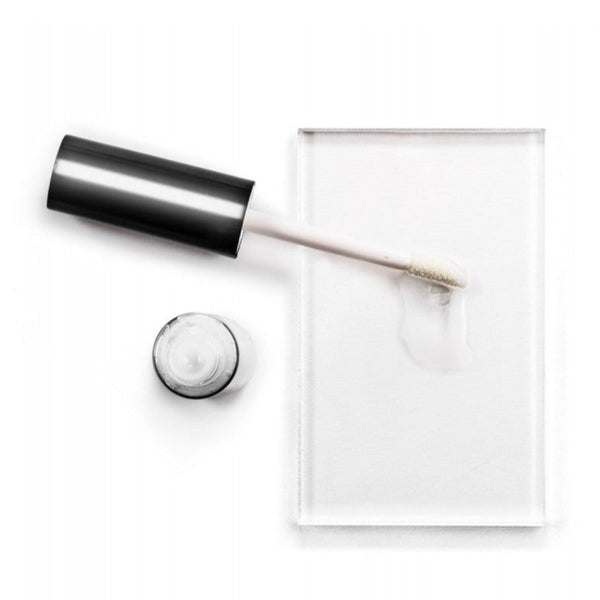 Avant Skincare Anti-Ageing Collagen Lip Line Corrector with its contents poured onto a slate