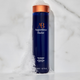 Augustinus Bader The Shampoo covered in soap suds