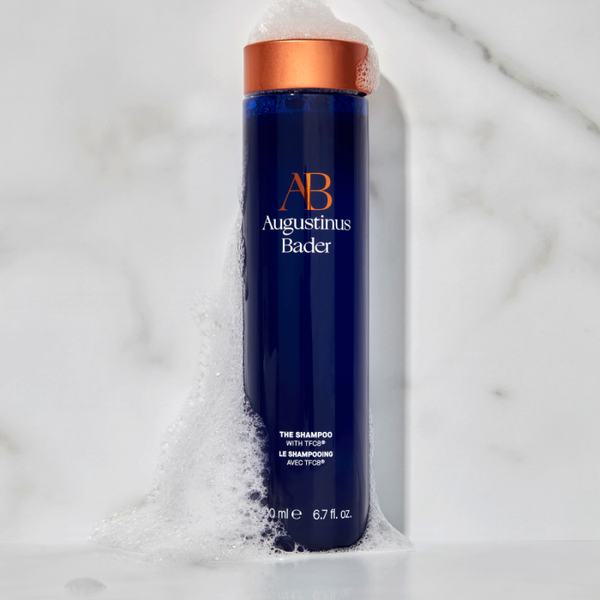 Augustinus Bader The Shampoo covered in soap suds