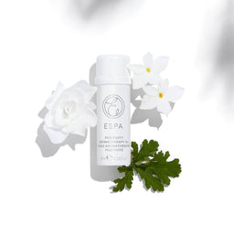 ESPA Positivity Aromatherapy Single Oil surrounded by its natural ingredients