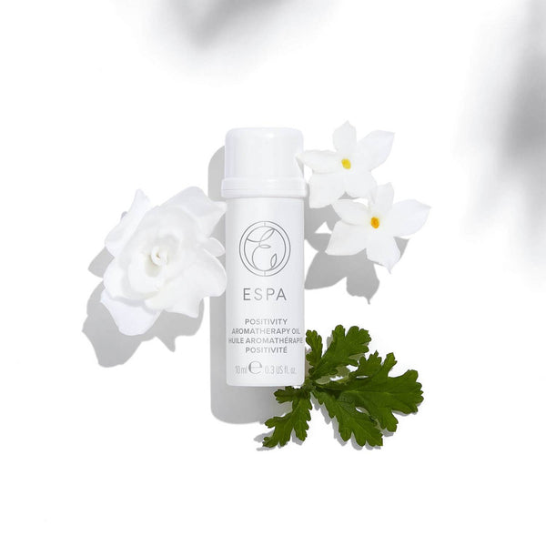 ESPA Positivity Aromatherapy Single Oil surrounded by its natural ingredients
