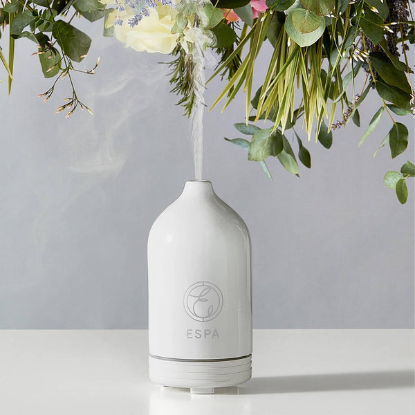 ESPA Aromatic Essential Oil Diffuser Pod turned on with steam flowing out
