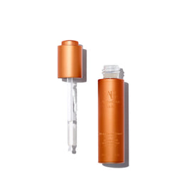 Augustinus Bader The Scalp Treatment with the lid open and dispenser to its left