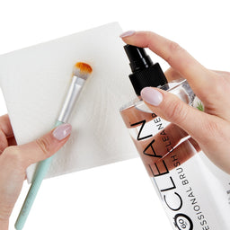 ISOCLEAN Makeup Brush Cleaner With Spray Top being sprayed onto a brush