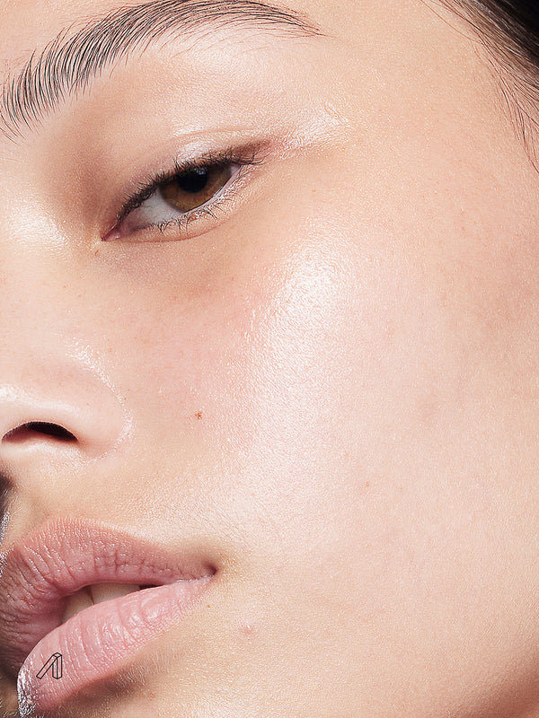 a closeup of a person with the serum applied