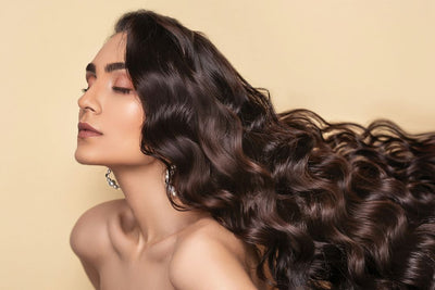 woman with long curly brunette hair
