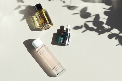 flatlay of three oskia skincare products