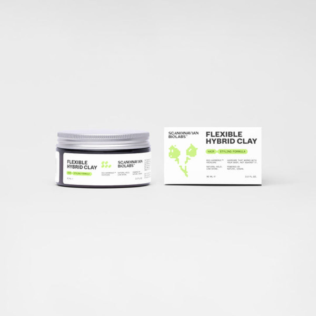 A jar of Scandinavian Bolabs Flexible Hybrid Clay next to its product box on a clean white background.