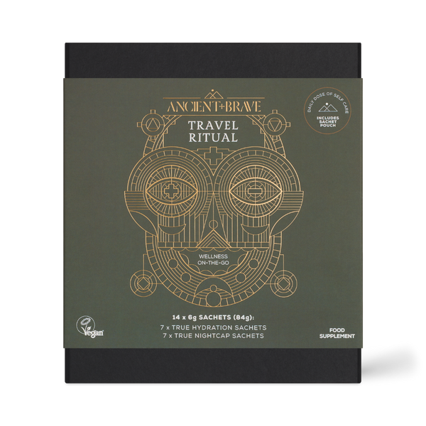 Ancient Brave Travel Ritual Wellness On-The-Go supplement box, featuring a dark olive green front with gold geometric owl artwork and black sides, shown on a white background.