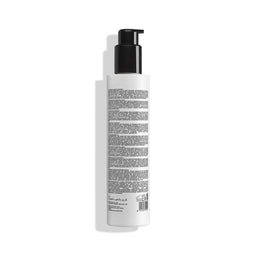 White bottle with black pump and label on a white background