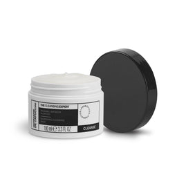 White jar with black lid and label on a white background