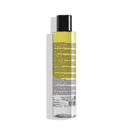 Bottle with yellow label on a white background