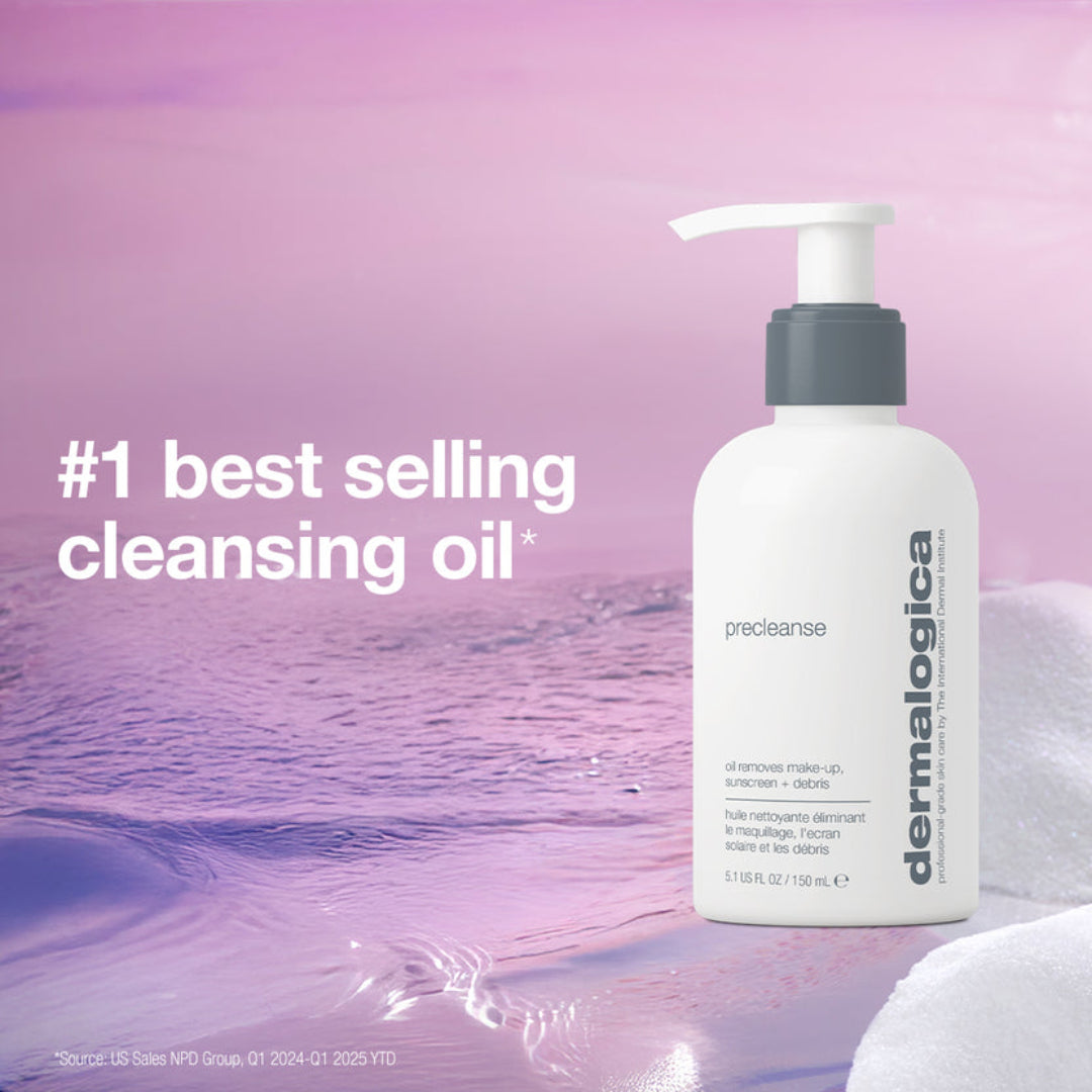 A white pump bottle of Dermalogica Precleanse cleansing oil stands on a pink and purple water-textured background with large text reading '#1 best selling cleansing oil'.