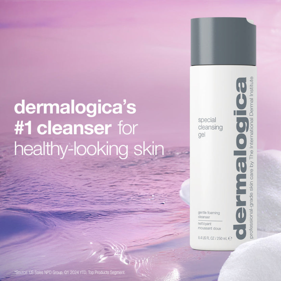 A bottle of Dermalogica Special Cleansing Gel stands on white towels against a pink and purple water-textured background with marketing text on the left.