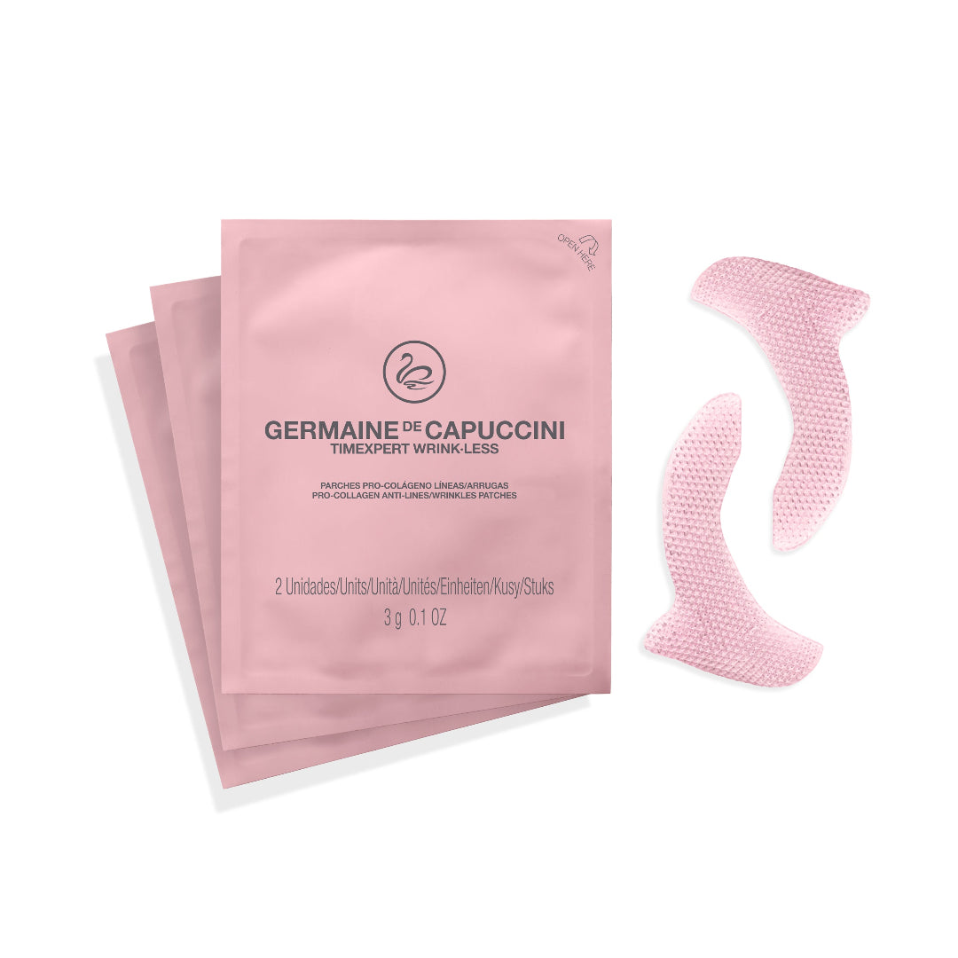 Two pink sachets of Germaine de Capuccini Timexpert Wrink-Less alongside two pink textured silicone eye patch stickers on a white background.