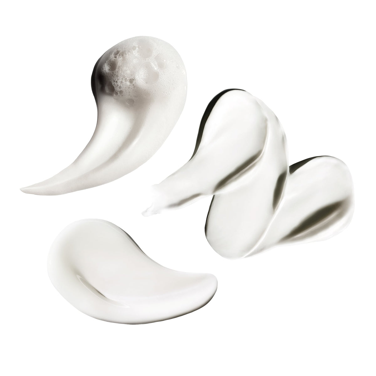 Three translucent, flexible silicone ear plugs in white and clear shades, arranged on a solid white background.