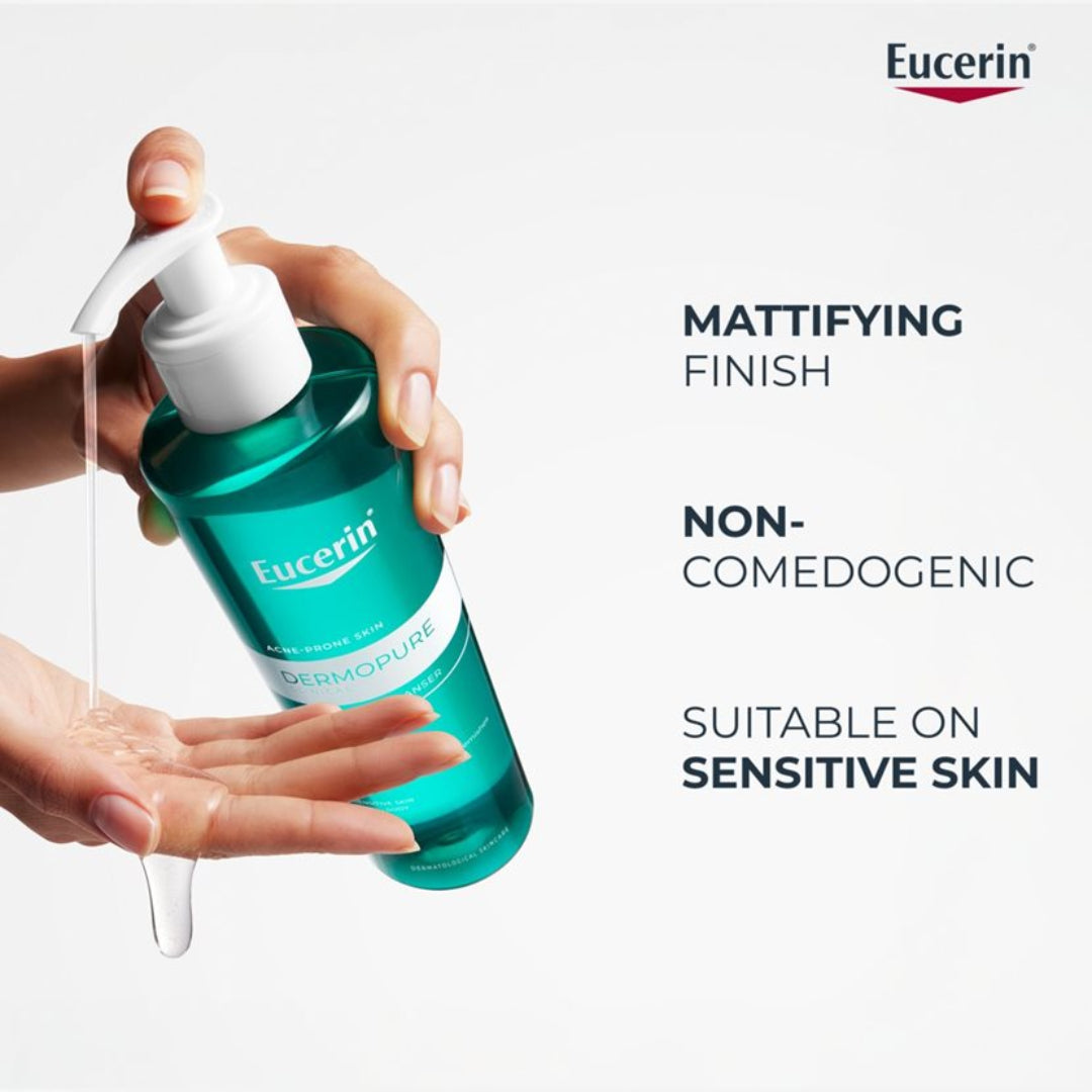 Eucerin Dermopure bottle being held with text about product features on a white background