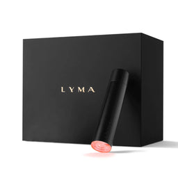 A sleek black Lyma device with a glowing pink tip stands in front of a matte black Lyma box on a clean white background.