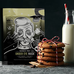 Barber Pro under eye mask packaging with a stack of cookies and a glass of milk.