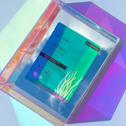 BeautyPro Retinol sheet mask packaging on a colorful geometric background