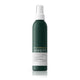 Green spray bottle with white cap labeled 'Philip Kingsley Density' on a white background