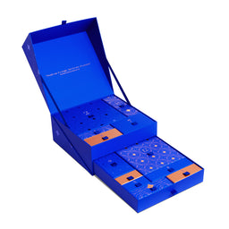 Blue gift box with intricate design on a white background