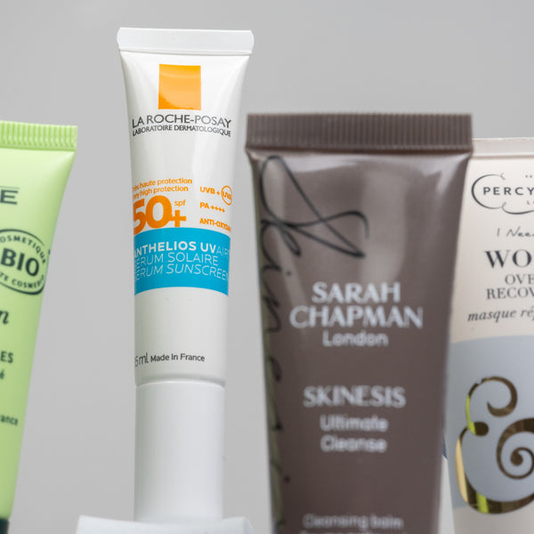 Collection of skincare products including La Roche-Posay and Sarah Chapman on a gray background