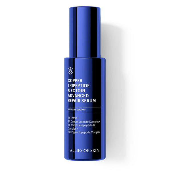 A tall, cylindrical blue bottle of Allies of Skin Copper Tripeptide & Ectoin Advanced Repair Serum, featuring a matching blue cap, set against a clean white background with a soft shadow.