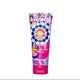 Colorful tube of mika hair product on a white background