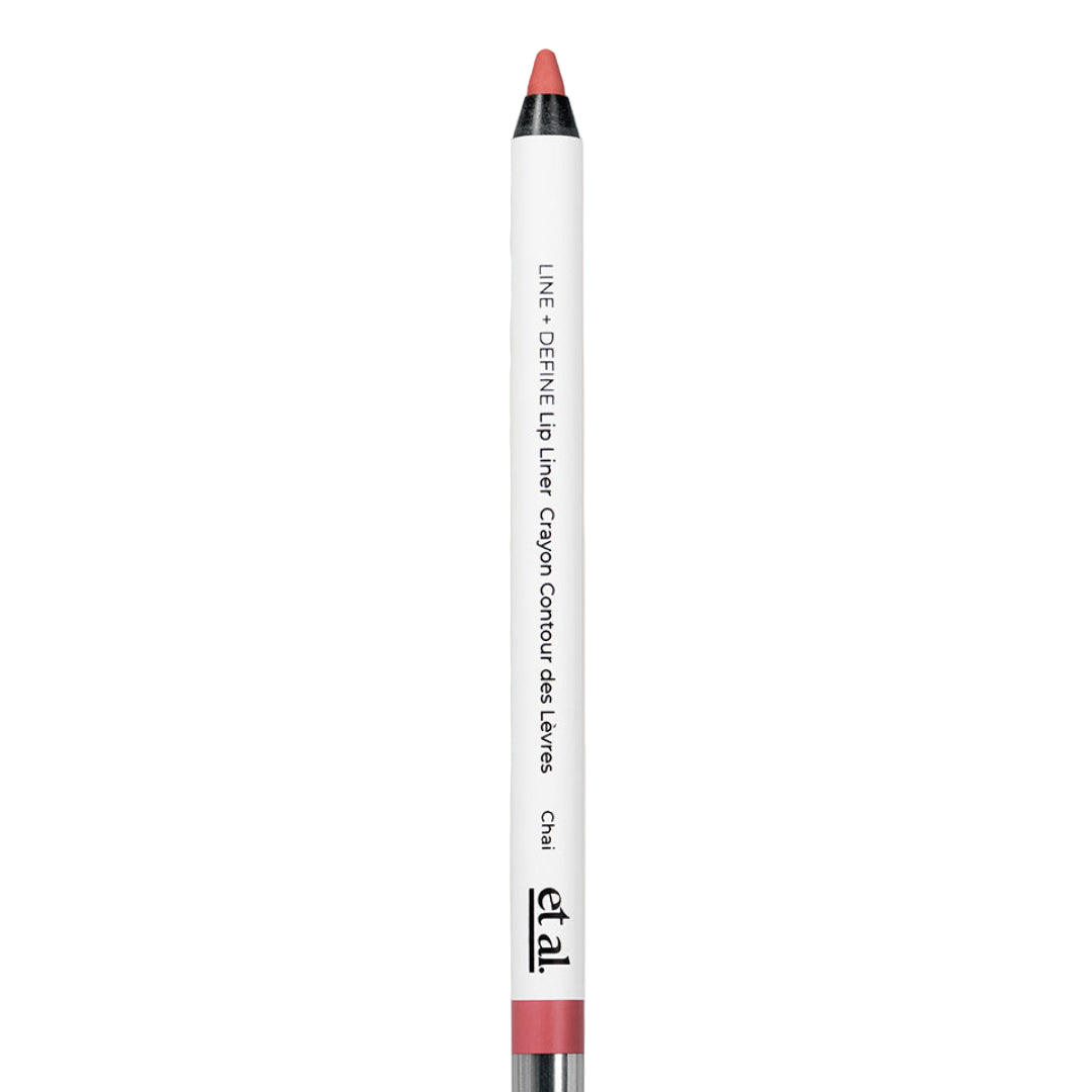 Lip liner with red cap and black tip on a light gray background