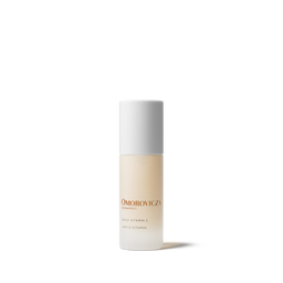Omorovicza Daily Vitamin C Tinted Moisturizer bottle, featuring a frosted glass bottle showing the beige-tinted liquid inside, a white cap, and gold lettering on a clean white background.