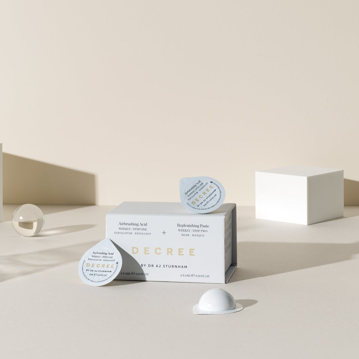 Decree Weekly Decree packaging with multiple capsules on top