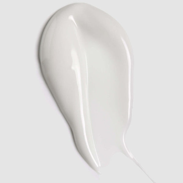White ceramic spoon rest on a light gray background