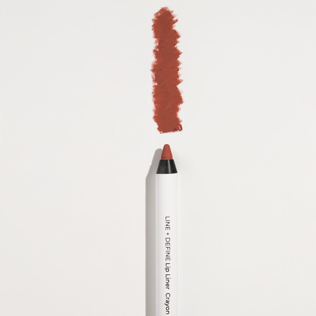 Lip liner pencil with color swatch on a light gray background