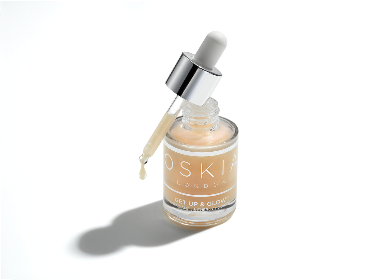 OSKIA Get Up & Glow bottle with its lid perched on the top of the bottle