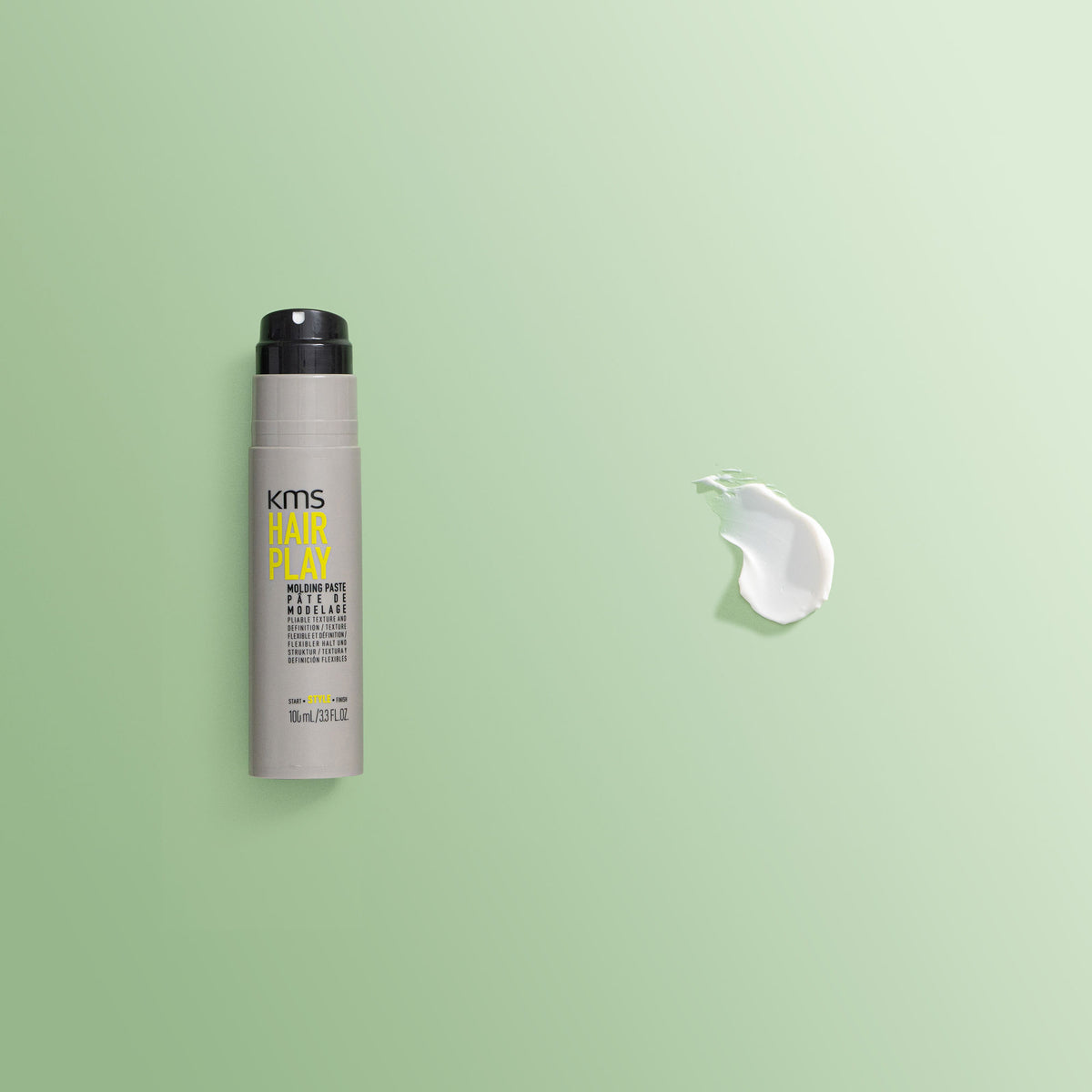 KMS Hair Play product on a green background