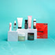 Collection of skincare products on a light blue background