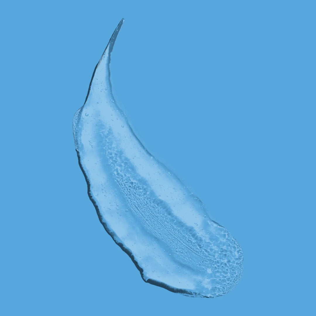 Blue gel or cream smear on a blue background
